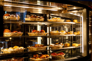 Showcase pastry shop, a lot of different cakes and pastries, desserts