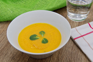 Carrot creme soup on a table