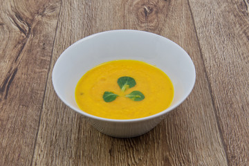 Carrot creme soup on a table