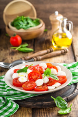 Tomato salad with mozzarella cheese and olive oil