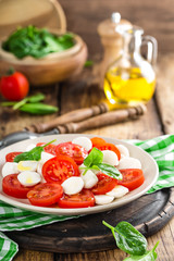 Tomato salad with mozzarella cheese and olive oil