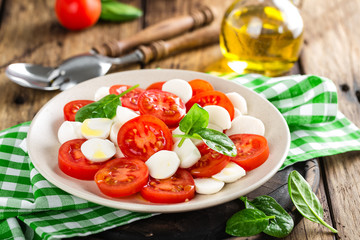 Tomato salad with mozzarella cheese and olive oil