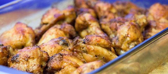 Roasted chicken wings - banner design - macro, closeup