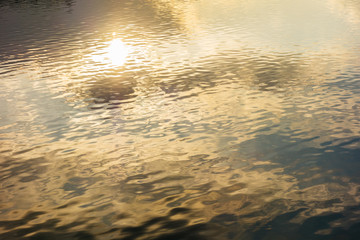 warm colored water in the eve sun