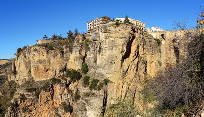 Fototapeta na wymiar Cliffs of Ronda town with old bridge, Andalusia, Spain