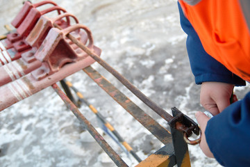 railway brake shoes of red color lie on the rack. railway skid. railway station. train shoe.