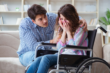 Desperate disabled person on wheelchair