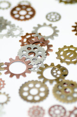 gears cog wheels metal colored very small macro view