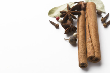 Spices and herbs isolated on white. Copy space