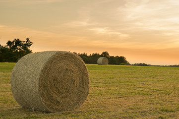 hay bails in farm field landscape scene background images