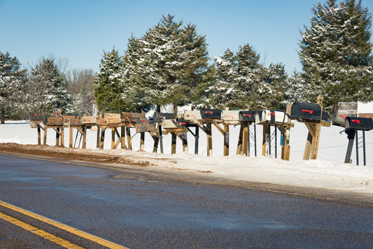 mailboxes mailbox on country road snow day old many multiple boxes