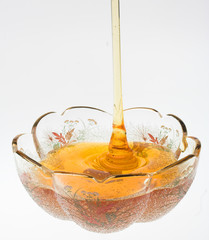 honey close up over white background