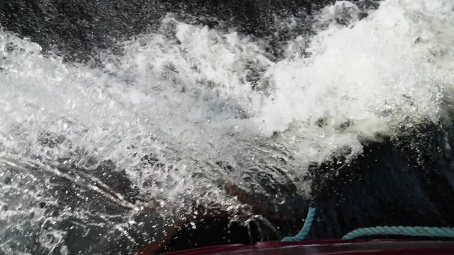 Wake behind a boat as it travels through the water