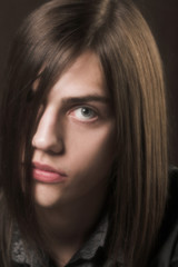 Fototapeta premium young man with long hair
