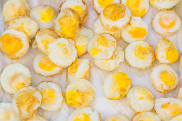 fried quail eggs on white background