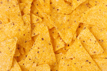 Classic mexican snack -  nachos background, top view.