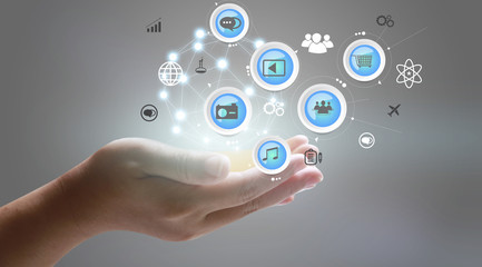 Application icons interface on hand. Social media concept