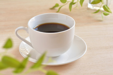 ホットコーヒー　木目背景
