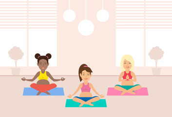 pregnant women sitting in yoga poses in room