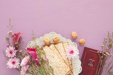 Pesah celebration concept (jewish Passover holiday). Traditional book with text in hebrew: Passover Haggadah (Passover Tale).
