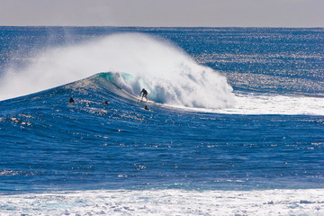 surfer on wave at yallingup surf south west western australia