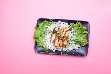 Spicy chicken steak with vegetable top view