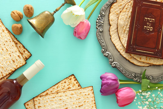Pesah celebration concept (jewish Passover holiday). Traditional book with text in hebrew: Passover Haggadah (Passover Tale).