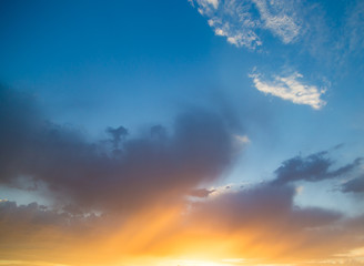 Naklejka na ściany i meble Beautiful clouds in the sky at sunset