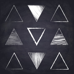 Chalk drawn isosceles triangle. Geometric figures on chalkboard background.