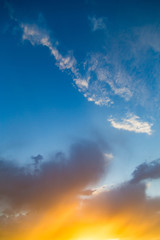 Naklejka na ściany i meble Beautiful clouds in the sky at sunset