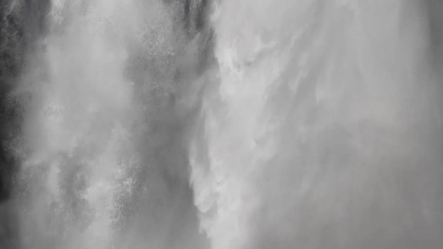 a 180p conformed to 30p slow motion extreme close up of lower falls water in yellowstone national park, usa