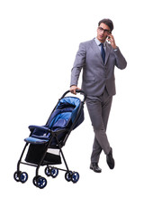 Young businessman nursing child in pram isolated on white