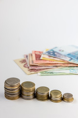 Money coins and banknotes from multiple countries