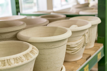 Clay pots on the shelf