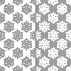 White and gray set of floral seamless patterns