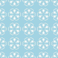 White floral seamless pattern on blue background