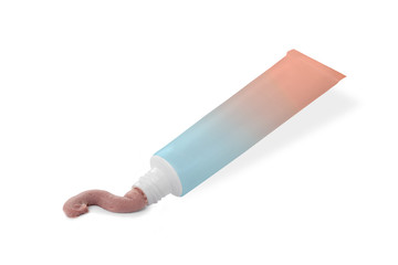 Colorful tube with pink cream on a white background
