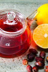 Fruit berry tea in the cup served on table