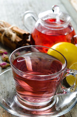 Fruit berry tea in the cup served on table