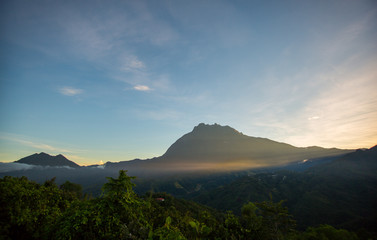 Obraz premium beautiful view of sunrise with mountain and ray of light 