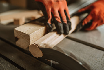 carpenter works with manual and electric equipment