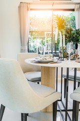 luxury dinning room with wooden table and classic style chair