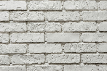 Textured white wall made of bricks