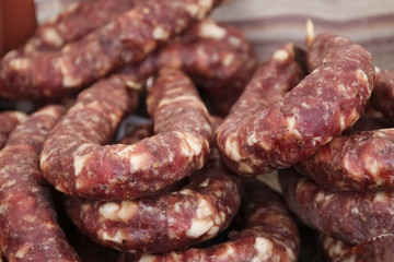 sausages, displayed in a farm butcher shop