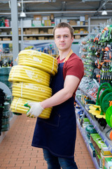 seller in building equipment tools store at work