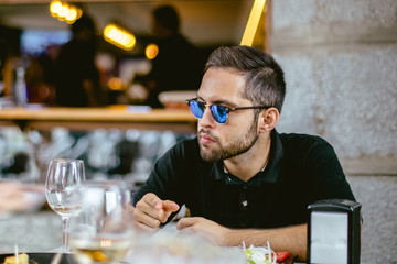 Portrait of Young man relaxing on teracce.