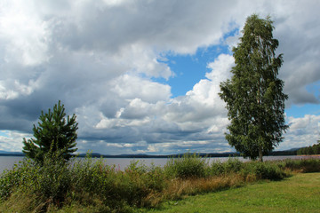 Beach by Orsa lake in Dalarna, Sweden, in August.