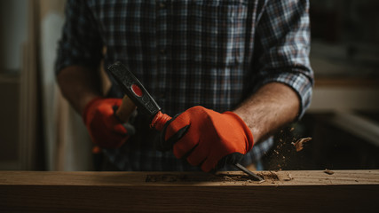 carpenter works with manual and electric equipment - obrazy, fototapety, plakaty