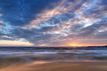 early morning sunrise on a choppy river / wind early spring landscape