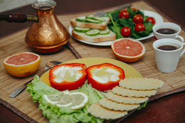 natural and healthy breakfast with toast, coffee and vegetables for vegetarian